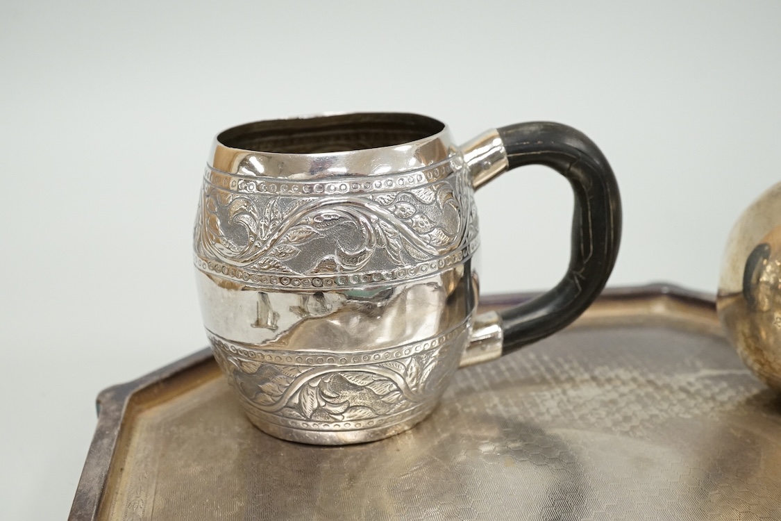 A late 19th century French small white metal Holy Water stoop, 11.4cm, together with a Victorian silver and leather mounted glass hip flask(a.f.), a late Victorian silver 'grenade' lighter by Sampson Mordan & Co, two sil
